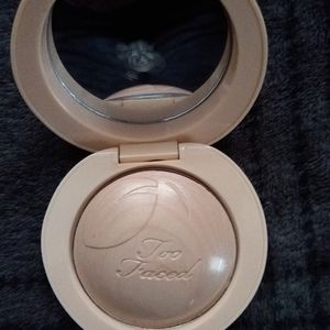 Too faced Peach frost highlighter